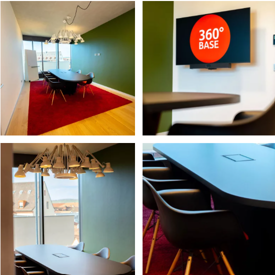 360° Base Studio. TIsch Nahaufnahme. TV an der Wand.